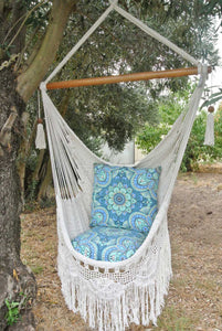Byron white hammock chair hanging outdoors