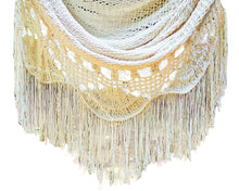 Detail view of the crochet fringe on the byron white hanging chair