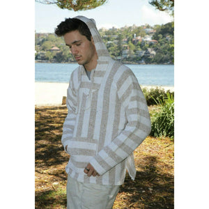 Male model wearing the beige and white stripe baja hoodie