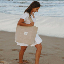 Model wearing beige tote bag plain