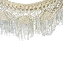 Closeup view of the byron white hammock crochet fringe