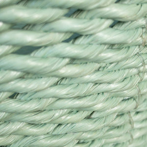 Closeup of the hand woven sage green large baskets