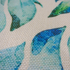 Closeup of the print on aqua palm print outdoor cushion covers