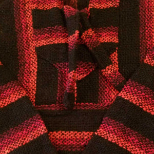 Detail view of the red and black kids baja hoodie
