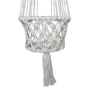 Detail view of the single white macrame plant holder