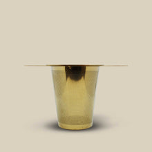 Front of gold tea strainer