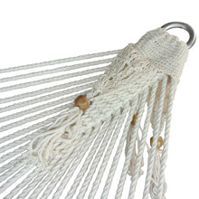 Detail view of hanging ring on the luxury macrame hammock