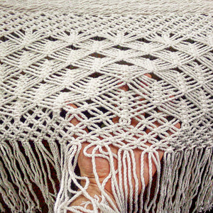 Detail view of the luxury macrame hammock macrame fringe