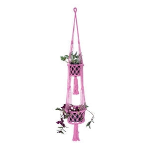 Double pink macrame potholder full view and styled with hanging plants