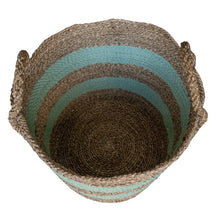 Inside view of extra large baskets natural with sage green striped handwoven pattern