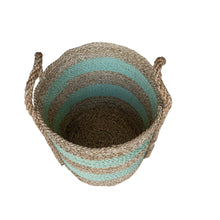 Inside view of green and natural stripe large planter baskets in the medium size