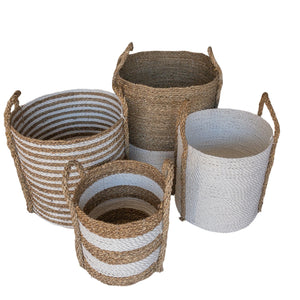 Top view of set of four mixed white large baskets