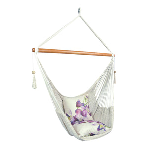 Side view of Manyana white hanging chair with Iluka Beach outdoor cushions