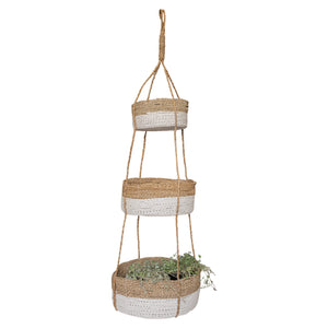 Triple hanging basket holding a hanging plant