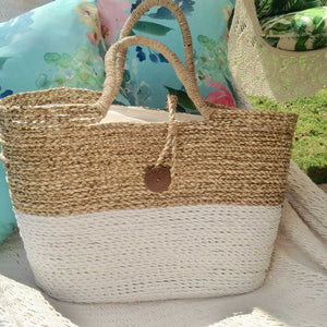 White basket beach bag at the beach