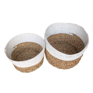 Top view of the set of two white and natural round wide storage baskets. Large and medium size