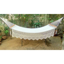 Whitehaven luxury boho hammock hung in an outdoor area